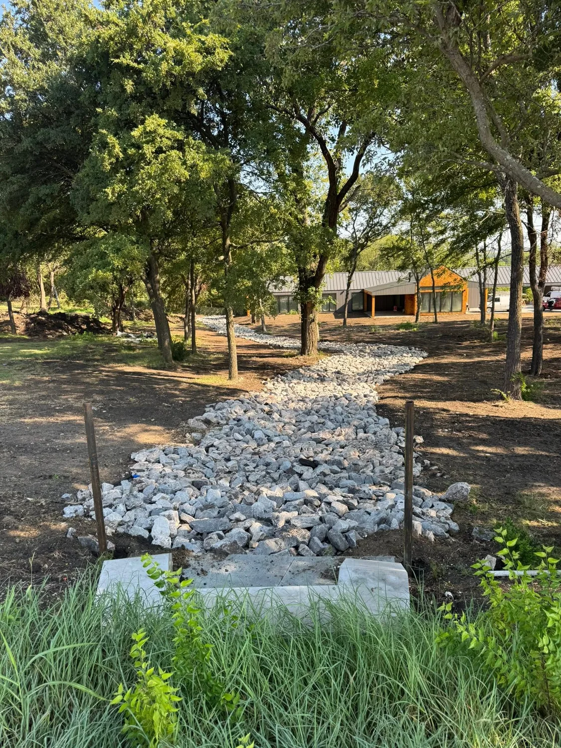 Rock-lined channel to a concrete headwall